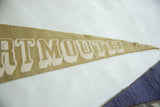 Faded green felt and cream block lettering on vintage Dartmouth pennant's tapered tip.