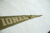 Aged texture and creasing at the pointed tip of a vintage green felt pennant.