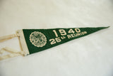 Angled perspective of the green felt Dartmouth pennant showing the vintage crest and reunion text.