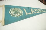 Vintage Lasell Junior College felt pennant close-up, with circular applique seal and cream binding.