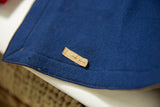 Vintage blue felt banner with stitched edge and 'Jane Goss' name tag.