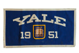 Vintage Yale 1951 felt banner, navy blue with off-white lettering, gold shield, 18x32.