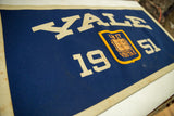 Blue felt vintage Yale 1951 banner, showing ivory lettering and collegiate crest.