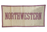 Vintage Northwestern felt banner, cream background, purple lettering and border, 18x34 inches.