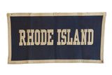 Vintage navy blue felt Rhode Island banner with raised beige lettering, 14x27.