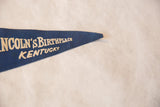 Close-up of the vintage blue felt pennant tip, showing 