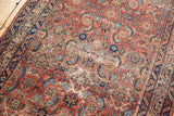 Close-up showing mostly even wear across the knot heads of the antique Malayer rug's Herati design.