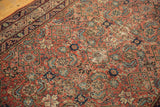 Detailed view of the Herati motif, showing storied repairs and wear to the knot heads on an antique runner.