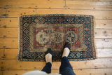 Antique Beshir rug's central geometric field shows prominent pile wear and foundation etching.