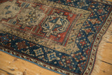 Aged pile and geometric main border of an antique Beshir rug corner.