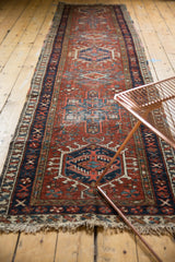 Vintage Karaja rug end showing original polychrome selvages and ivory fringe.