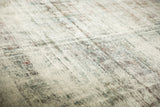 Distressed vintage Sarouk carpet texture showing etched foundation and exposed knot heads.