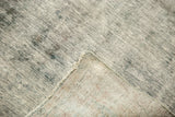 Vintage distressed Sarouk carpet's woven foundation and exposed knot heads.