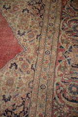 Distressed corner spandrel with blush red, navy, and sand floral motifs, showing subtle foundation.