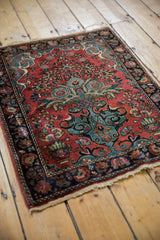 Persian Mohajeran Sarouk rug detail: dusty rose field, ornate tree of life, navy palmette border.