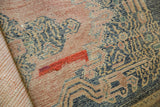 Red reweave detail on the mostly even wear of antique Senneh rug knot heads.