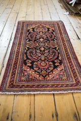 Vintage Lilihan runner's allover floral blossom motif, deep raspberry, charcoal navy, gold tones.