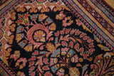 Variegated striped Lilihan rug border and dark navy floral pattern.