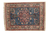 Hand-knotted Vintage Tabriz rug: sky blue field, blush trefoil medallion, ivory borders.