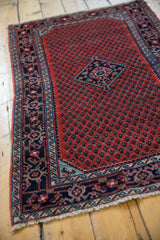 Fine vintage Engelas rug with a central diamond medallion surrounded by a field of repeating botehs.