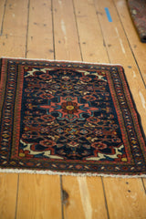 White fringe, low pile, and geometric minor border of the vintage Borchalou rug.