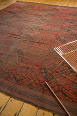Allover triple column gul motif on vintage Ersari carpet in deep red and navy.
