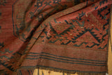 Vintage Ersari carpet: restored kilim end, navy stripes, madder root red ground, and fringe.
