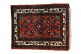 Vintage Engelas rug with a rusty red Herati field, a central diamond medallion, and floral borders.