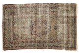Antique Kerman rug, faded ivory field, cochineal red floral medallion, navy vinery, 2'11