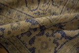 Vintage Distressed Oushak rug's worn pile texture in faded antique ivory and cobalt blue tones.