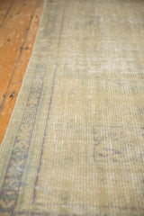Distressed Oushak runner texture, showing mostly even wear and faint foundation.