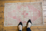 Vintage Oushak rug mat, distressed pale pink Rococo medallion, ivory, and powder blue. 1'10