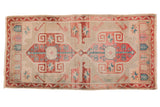 Distressed Oushak rug, double medallion, rams horn and pomegranate motifs, dusty red, aqua, silver.