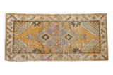 Distressed vintage Oushak rug runner, central gold, grey, green medallion, 2'6