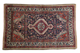 Vintage Persian Tajabad rug: floral palmette medallion, allover mahi mahi, navy, cherry red.
