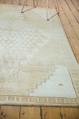 Vintage Distressed Oushak rug with stepped corner spandrel and faded pale coffee brown border.