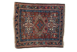Vintage Karaja rug, intricate triple medallions, geometric field, brick red, sky blue, ivory.