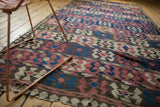 Antique Persian Kilim with horizontal bands of madder red, blue, and ivory geometric crab motifs.