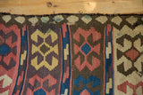 Persian Kilim's hand woven crab motifs in madder red, ivory, and saffron.