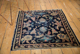 Antique Chinese rug corner featuring large scale palmettes, delicate vinery, and secure ends.