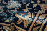 Antique Chinese rug, navy field with gold and aqua teal Persian floral design.