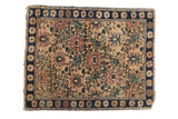 Vintage Persian Farahan Sarouk rug featuring an intricate allover trellis in navy, ivory, and pale blush.