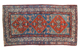 Hand-knotted vintage Malayer rug runner with triple red and abrashed blue medallions.