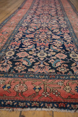 Antique Malayer runner: early-inspired blush border, navy Herati motif, light tatter.