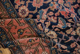 Antique Malayer runner with navy blue Herati motif and dusty blush 1800s-inspired border.