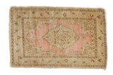 Collector antique distressed Persian Jalili Tabriz rug with dusty pink scalloped medallion, ivory field, and boteh motifs, 1'10