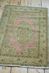 Antique distressed Tabriz rug corner, pale coffee brown, dusty pink boteh motif.