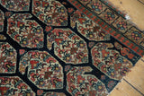 Oversized boteh pattern and reciprocating pawn border on this antique Northwest Persian rug with tattered edge.