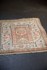 Vintage Persian Malayer rug's paneled medallion, pawn motif, and floral border in pink, ivory, blue.