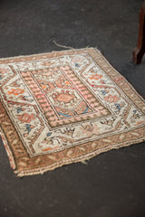 Vintage Malayer corner, showcasing reciprocating pawn and meandering vine floral border.